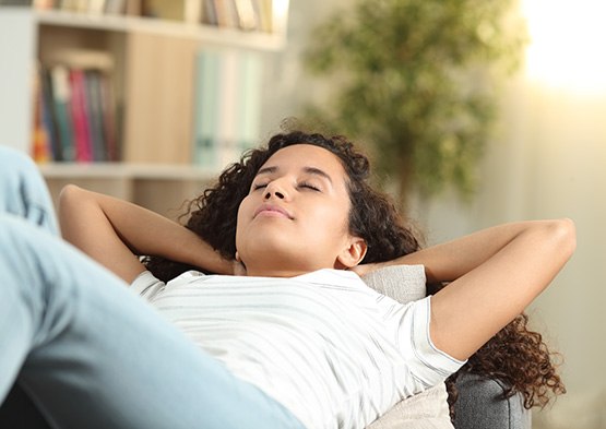 Woman resting on a couch